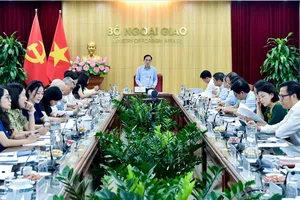 Cuộc họp liên ngành về công tác rà soát, đôn đốc thực hiện các cam kết, thỏa thuận quốc tế do Bộ Ngoại giao tổ chức tại Hà Nội, ngày 9-7. Ảnh: QUANG HÒA