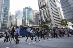 Người lao động tại Singapore. Ảnh: CNA/ISTOCK 