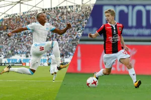 Clinton Njie (trái) và Vincent Koziello (phải)