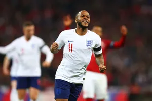 Raheem Sterling mừng bàn thắng ở tuyển Anh.