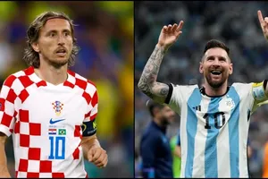 Luka Modric và Leo Messi