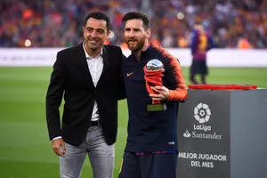 Xavi và Messi