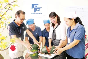Liên đoàn Lao động quận 1 và doanh nghiệp tổ chức tất niên cho công nhân không có điều kiện về quê ăn tết. Ảnh tư liệu