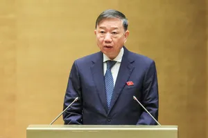 Bộ trưởng Bộ Công an Tô Lâm trình bày tờ trình. Ảnh: QUANG PHÚC  