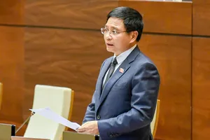 Bộ trưởng Bộ Tài chính Nguyễn Văn Thắng phát biểu giải trình, làm rõ một số vấn đề đại biểu Quốc hội nêu, chiều 9-12. Ảnh: VIẾT CHUNG 