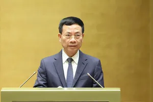 Bộ trưởng Bộ KH-CN Nguyễn Mạnh Hùng báo cáo về Luật Trí tuệ nhân tạo. Ảnh: QUANG PHÚC 