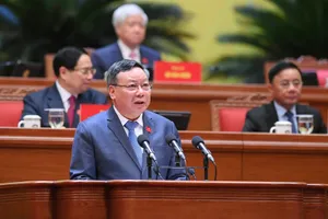 Phó Bí thư Thường trực Thành ủy Hà Nội Nguyễn Văn Phong trình bày tham luận tại đại hội. Ảnh: QUANG PHÚC 