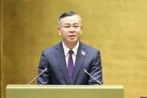 Bộ trưởng Bộ Tài chính Ngô Văn Tuấn giải trình về đề xuất giảm thuế. Ảnh: QUANG PHÚC