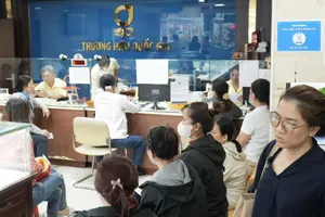 Giá vàng miếng SJC và vàng nhẫn 9999 chiều 29-1 cùng "hạ nhiệt"