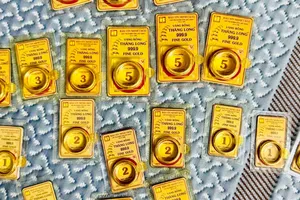 Giá vàng chiều 11-8 quay đầu giảm mạnh. Ảnh: NHUNG NGUYỄN