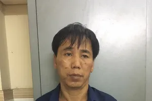 Đối tượng tại cơ quan công an. Ảnh: ĐAN NGUYÊN 