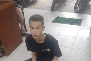 Đối tượng Nguyễn Thành Đạt tại cơ quan công an 