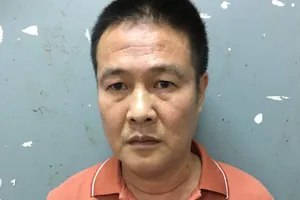 Đối tượng Dương Xuân Hưng tại cơ quan công an. Ảnh: C.T