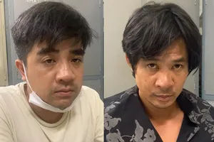 Hải và Thi (từ trái quan phải) tại cơ quan công an. Ảnh: CHÍ THẠCH 