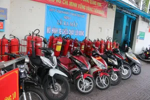 Ra mắt mô hình xe máy chữa cháy lưu động trong khu dân cư đầu tiên ở TPHCM. Ảnh: P.Nam