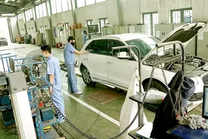 Các trung tâm đăng kiểm đã hoạt động ổn định. Ảnh: VIẾT CHUNG