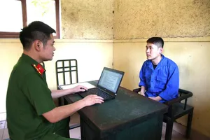 Đinh Văn Vương tại cơ quan công an