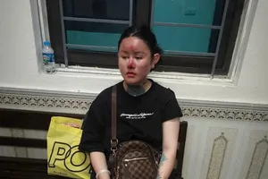 Nguyễn Thị Hoàng Ngân tại cơ quan công an. Ảnh công an cung cấp