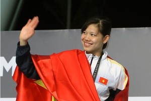 阮氏映圓領獎牌。