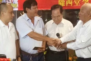 圖為李庭輝父子。（資料圖源： 磊 磊）