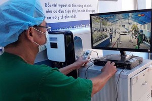 嘉定人民醫院以紅外線攝像機觀察病人的體溫。