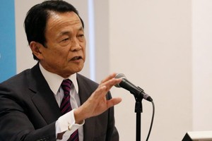 日本副首相兼財務相麻生太郎在紐約發表演講。（圖片來源：路透社）