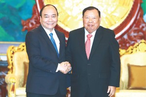 阮春福總理會見老撾國家主席本揚‧沃拉吉。