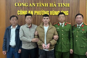 公安力量逮捕李文武逃犯。