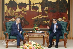 政府总理范明政会见比利时驻越南大使卡尔·范登博舍。