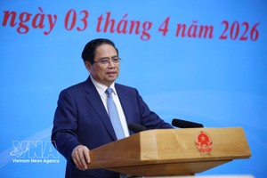 政府总理、国家国际融入指导委员会主任范明政发表讲话。