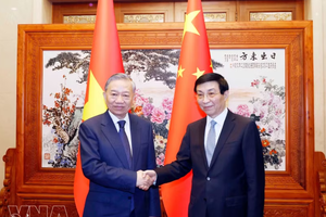 党中央总书记、国家主席苏林会见中国全国政协主席王沪宁。