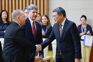 政府总理黎明兴会见并与美国-东盟商务理事会高级企业代表团举行工作会议。图：杨江/越通社