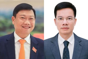 河内市人委会新任副主席杜英俊（左）与裴维强。