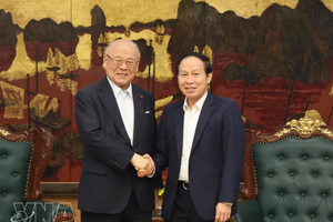 越南政府副总理黎进珠会见日越友好议员联盟特别顾问武部勤。图自越通社