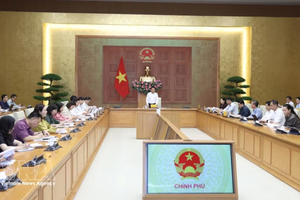 会议现场。图自越通社