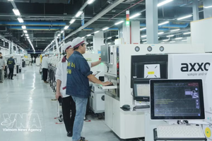 越南Wistron Infocomm有限责任公司生产车间。图自越通社