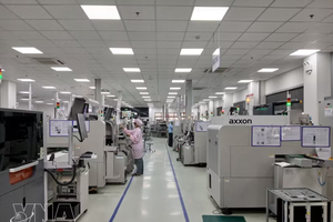 岘港高科技园区EMS中南工厂利用SMT技术的电子设备生产线。图自越通社