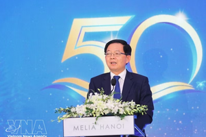 越南政府副总理胡国勇发表讲话。图自越通社