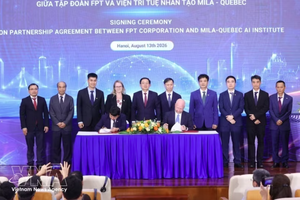 签署仪式现场。图自越通社