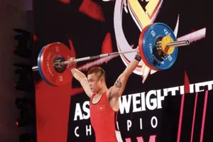 Lực sĩ Lại Gia Thành đã xếp nhất tổng cử của hạng 55kg tại giải vô địch châu Á năm nay. Ảnh: AWF