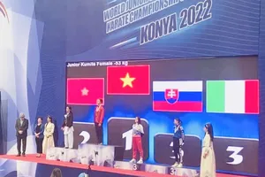 Võ sĩ Diệu Ly giành HCV quý giá ở giải trẻ thế giới 2022. Ảnh: VSH