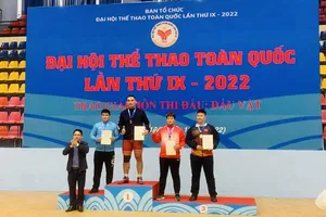 Hà Văn Hiếu giành chiến thắng tuyệt đối hạng siêu nặng 125kg tại Đại hội thể thao toàn quốc năm nay. Ảnh: N.CƯƠNG