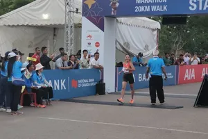 Thanh Phúc đã về nhất đi bộ 20km nữ tại SEA Games 32 và giành HCV đầu tiên cho điền kinh Việt Nam. Ảnh: ĐKVN