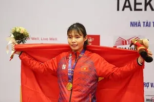 Võ sĩ taekwondo Bạc Thị Khiêm là người sẽ tham gia cầm cờ Đoàn thể thao Việt Nam tại lễ khai mạc ASIAD 19. Ảnh: LƯỢNG 