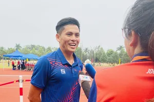 Lương Minh Sang vẫn phải bó chân khi thi đấu nhưng giành được HCV đáng khích lệ. Ảnh: MINH MINH