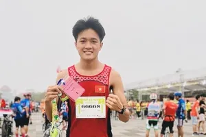 Tuyển thủ quốc gia Lương Đức Phước về nhất cự ly 10km tại giải. Ảnh: Đ.P