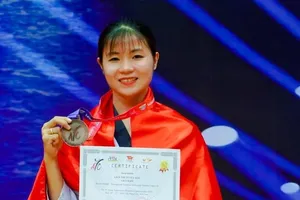 Võ sỹ taekwondo Việt Nam giành HCĐ quyền biểu diễn trong ngày tranh tài đầu tiên. Ảnh: TAEKWONDOVN