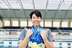 Nguyễn Quang Thuấn đã thi đấu xuất sắc tại giải bơi-lặn vô địch nhóm tuổi trẻ quốc gia 2024. Ảnh: Q.THUẤN