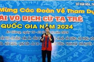 Gương mặt trẻ Kim Lụa của cử tạ Lào Cai có kết quả tốt ở giải năm nay tại An Giang. Ảnh: HOÀNG DUYÊN