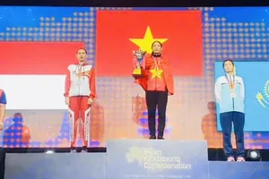 Tuyển thủ Việt Nam có chiến thắng trong những trận chung kết đầu tiên ở ngày 12-10. Ảnh: THỊNH VŨ